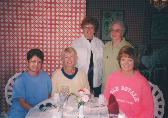 Five girls at suppper